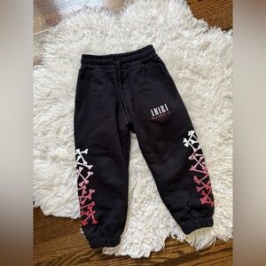 Amiri Kids Black Joggers with Red and White Accents